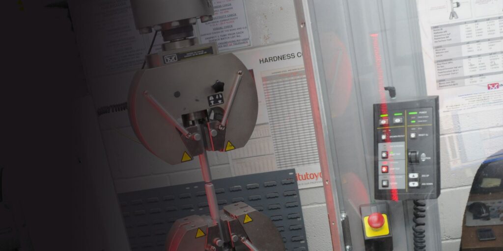 Materialeprøve i Renthals testmaskine — Enghave Motor